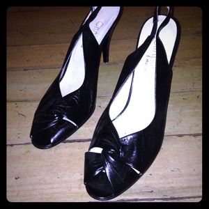 Vintage Italian leather heals, never worn.