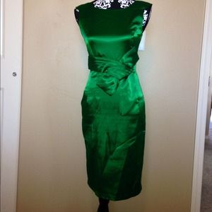Sleek emerald green holiday dress.