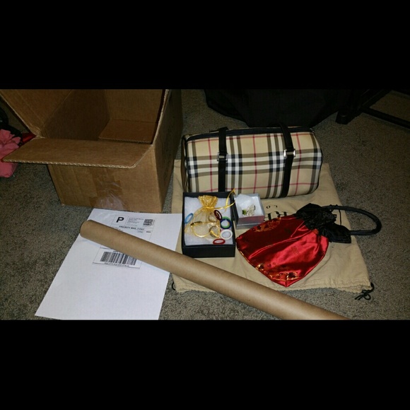 SOLD!!!!Authenthic burberry papillion pre  love.
