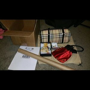 SOLD!!!!Authenthic burberry papillion pre love.