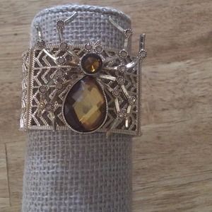 Gold tone spider bracelet
