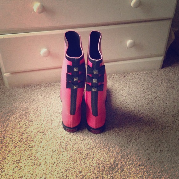 Pink &black rain boots.
