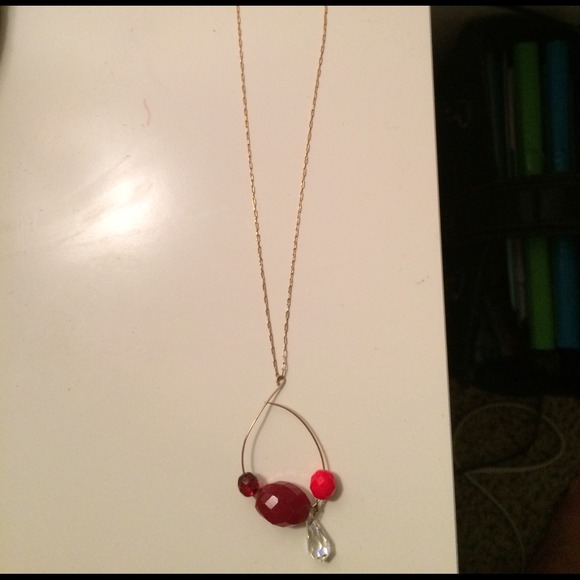 Gold necklace with the red and Crystal pendant