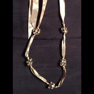 Rose gold colored necklace