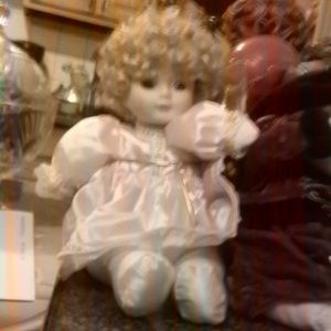 Bisque porcelain musical doll