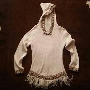 Brown and cream fringed sweater with tribal print.