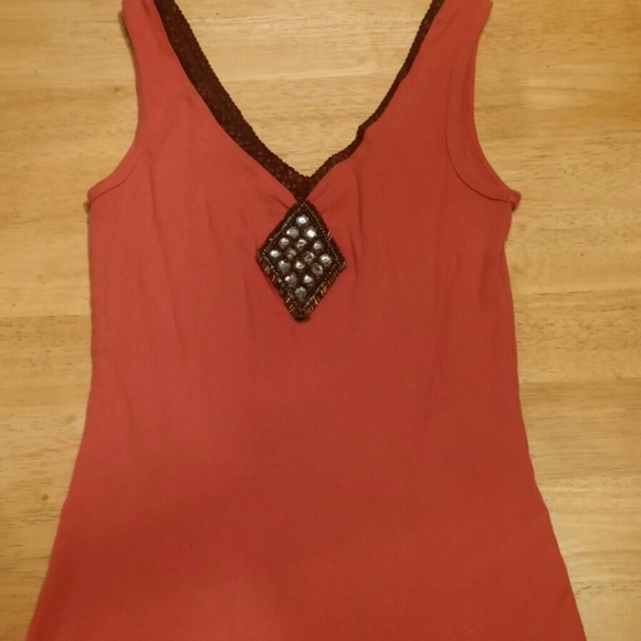 Tank with jewels