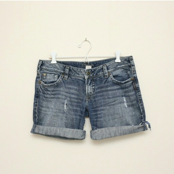 Silver distressed dark denim cut off shorts