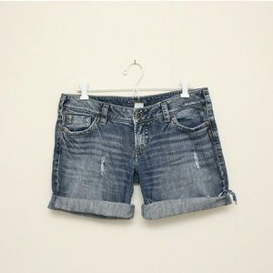 Silver distressed dark denim cut off shorts
