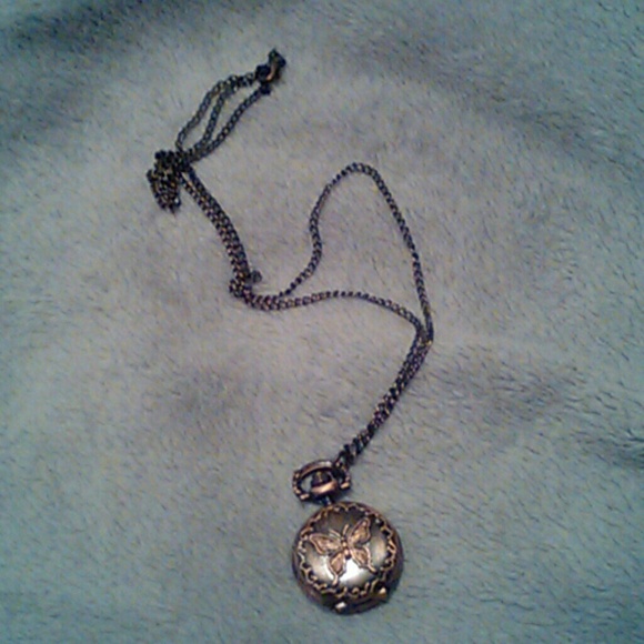 Locket with clock. Needs new battery