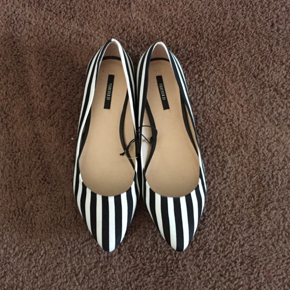 Black and white striped flats