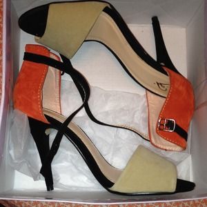 Orange, black and beige heels.