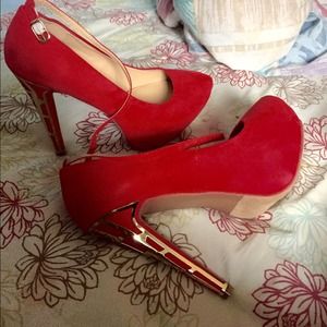 Brand new, never worn, super cute red heels