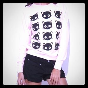 Cute cat shirt comes in light pink super cute!