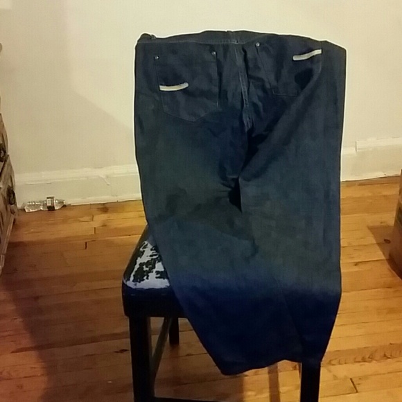 A pair of jeans,  blue,  brand new
