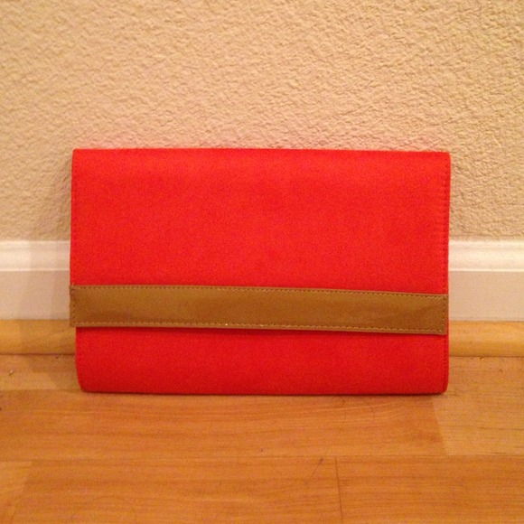 Orange clutch on a chain