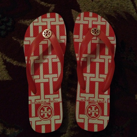 Tory Burch orange flip flops