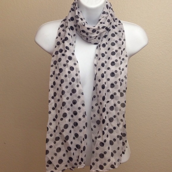 White neck scarf with black polka dots