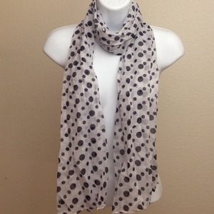 White neck scarf with black polka dots