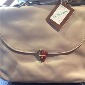 All leather hand bag made in Italy.