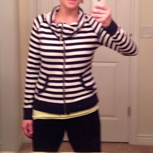 Calvin Klein Performance runners zip up.