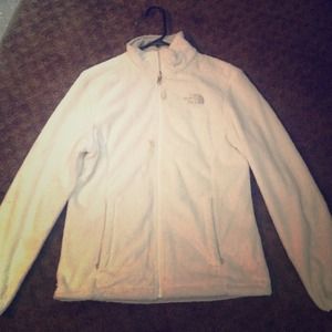 white fluffy north face coat