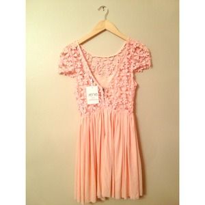 Super cute low-back dress from Xenia Boutique!