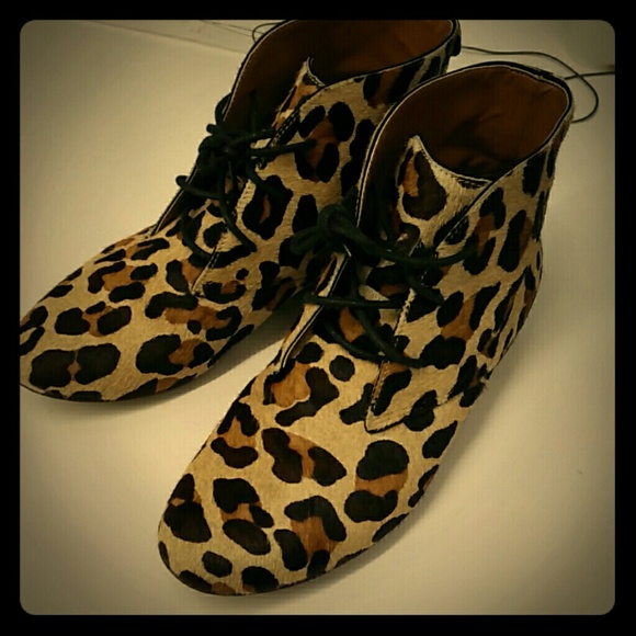 Gently used booties in animal printed mohair
