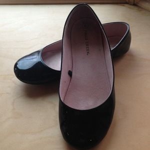 Shiny black ballet flats