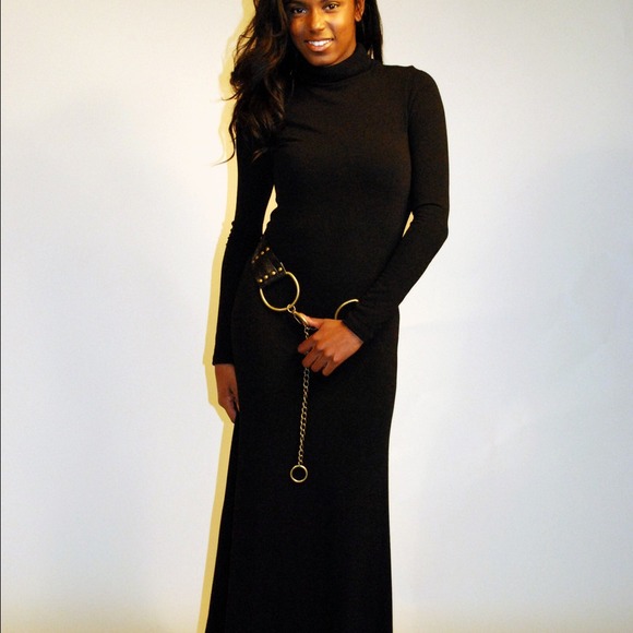 Black belted turtleneck dress.