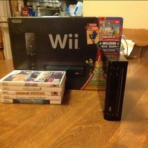 SOLD Black Wii cosole with 2 controllers & 5 games