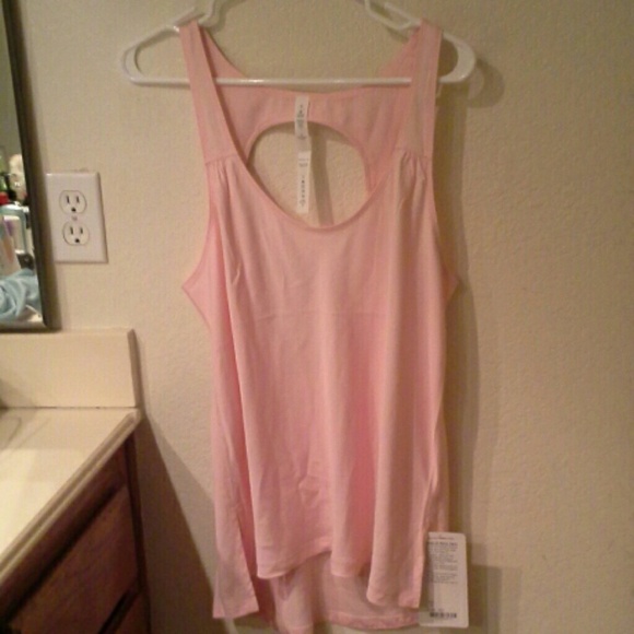 Light pink lulu open back tank size 8