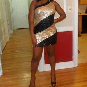 Black and gold sequin dress