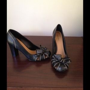 9 black heel. Never worn. Xhilaration.