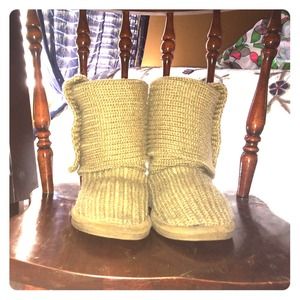 Bear paw knit tall boots.