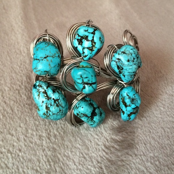 Turquoise and silver cuff bracelet.
