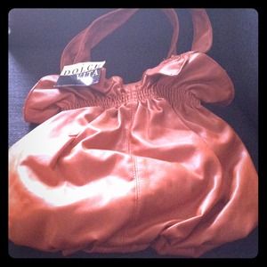 Never been used orange handbag.