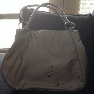 Gently used silver handbag.