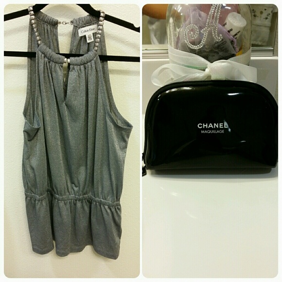 Cute Calvin Klein top/ Chanel Makeup pouch!!