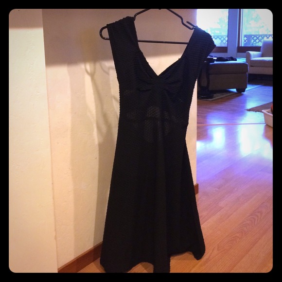 Short black a-line dress with criss cross back