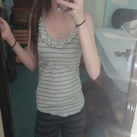 White and grey tank top.