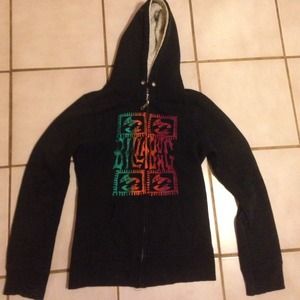 Black Billabong jacket. Green/Orange/Red deco.