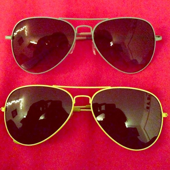 Blue and green framed sunglasses