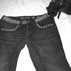 Black studded skinny jeans