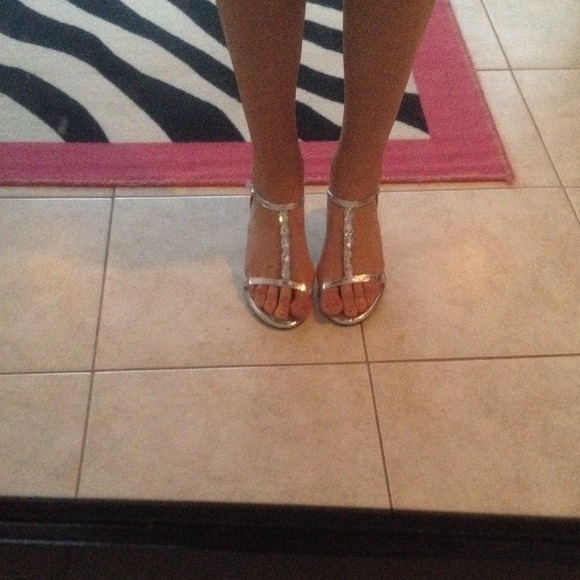 Gorgeous, silver, small heels. Never worn!