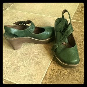 Green leather 3.5 inch heeled clogs. Size 7