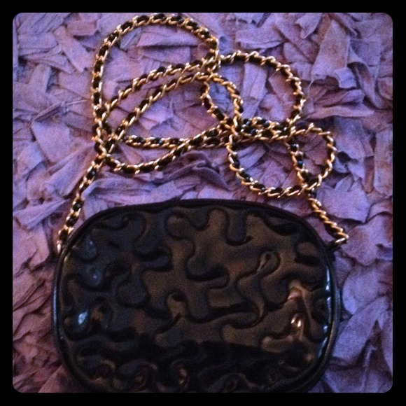 A black and gold purse
