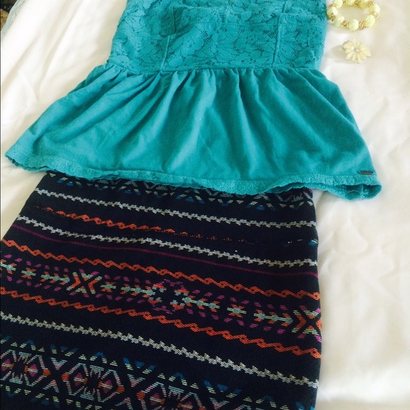 Bundle skirt shirt and bracelet and flower ring.