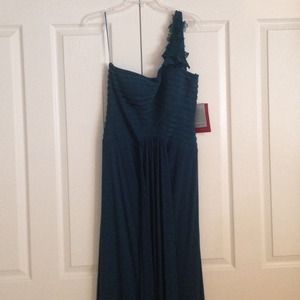 Teal, long, flowing evening dress.