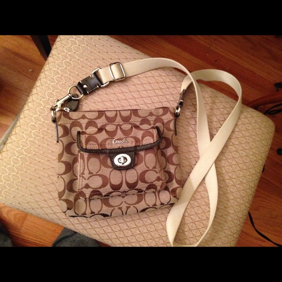 Brown Coach cross body handbag